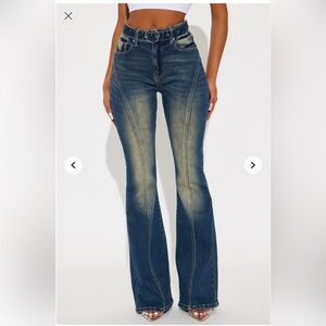 FASHION NOVA Nobody But You Tinted Stretch Belted
Flare Jeans - Dark Wash